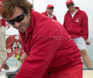 Duran Duran star Simon Le Bon mucks in with the crew onboard maxi yacht Arnold Clarke Drum at the start of the Fastnet Race 2005