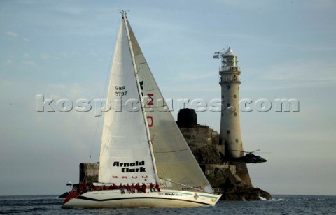 Maxi yacht Arnold Clark Drum rounding the Fastnet Rock off the coasts of Baltimore  Ireland  09 08 2