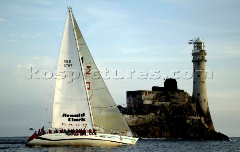 Maxi yacht Arnold Clark Drum rounding the Fastnet Rock off the coasts of Baltimore  Ireland  09 08 2