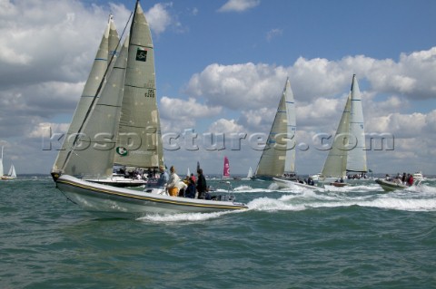 Yachts and chase boats at the start of the Rolex Fastnet Race 2005