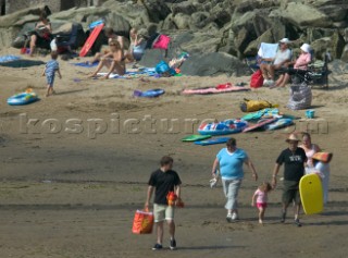 Kids, children and family playing on a sandy beach