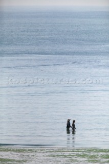 Two ladies bathing in the sea at Salcombe