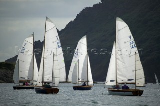 Fleet of classic yawls sailing in Dartmouth, Devon, UK