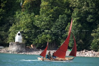 Classic yawl sailing on the Devon coast