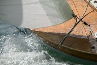 Deck and sail detail on classic wooden yacht