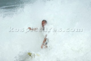 Surfer nearly wipes out in big surf at the Rip Curl Championship 2005