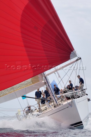 Flying Dragon under red spinnaker at Antigua Sailing Week