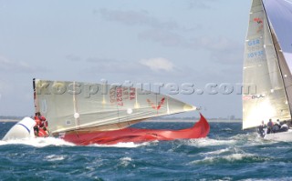 Racing yacht broaching in rough sea