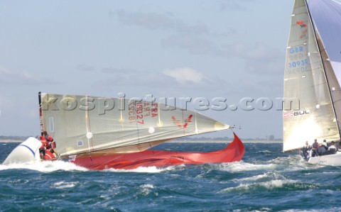 Racing yacht broaching in rough sea