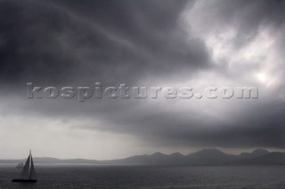 Sailing yacht under stormy sky. Porto Cervo, Sardinia