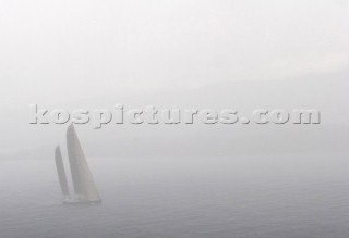 Sailing yachts in thick fog. Porto Cervo, Sardinia