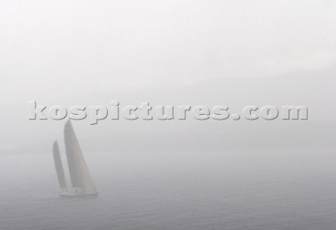 Sailing yachts in thick fog Porto Cervo Sardinia