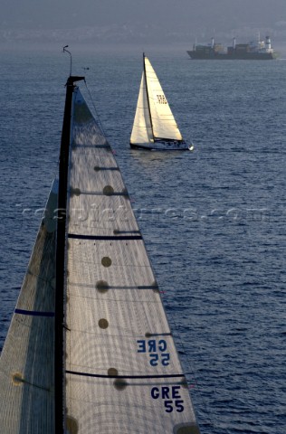 Yachts sailing through the Messina Straits during the Rolex Middle Sea Race 2005