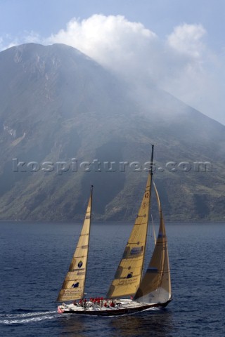 Steinlager II sails passed Stromboli Island during the Rolex Middle Sea Race 2005