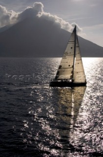 SPIRIT OF JETHOU sails passed Stromboli Island. Rolex Middle Sea Race 2005