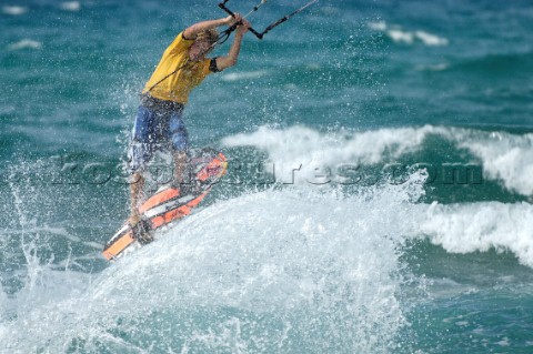 Kitesurfer takes off in strong breeze