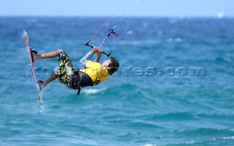 Kitesurfer in mid air in strong breeze