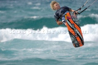 Kitesurfer in mid air in strong winds