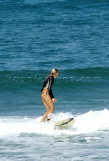 Female surfer on long board
