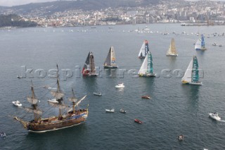 The Volvo Ocean Race fleet head head out to sea at the start of leg one from Vigo in Spain .