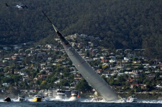 Wild Oats smash the record. Wild Oats XI sailing across the finish line in Hobart, Australia, Dec. 28, 2005. 85 yachts of all sizes battled for this years line honors in this the 61st running of the world famous race.