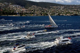 Wild Oats sail across the finish line in Hobart, Australia,Dec. 28, 2005. 85 yachts of all sizes battled for this years line honors in this the 61st running of the world famous race.