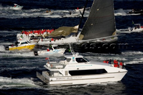 Wild Oats sail across the finish line in Hobart AustraliaDec 28 2005 85 yachts of all sizes battled 
