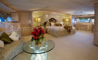 Luxurious master stateroom and bedroom onboard a superyacht