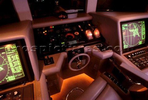 Controls equipment technology instrumentation and wheel on the bridge of a superyacht
