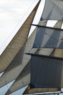 Graphic sails and shapes of the masts and sails of a cruising superyacht cruise ship
