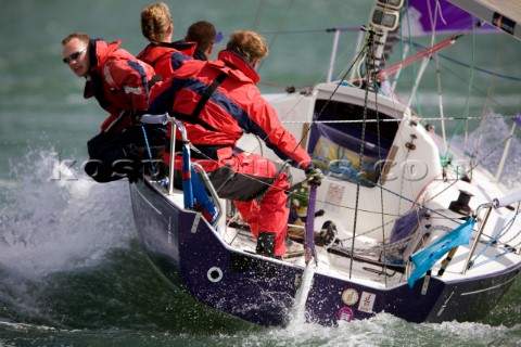COWES ENGLAND  AUGUST 1 Ben Walker tactician onboard the J80 sportsboat Savage Sailing Team hiking h