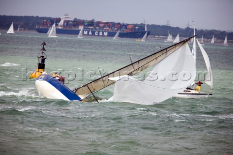 COWES ENGLAND  AUGUST 1 The blue hulled yacht Runaway broaching during a gust of wind on Day 4 of Sk