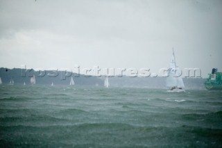 COWES, ENGLAND - AUGUST 1: A torrential downpour of rain crosses the J80 Sportsboat fleet during Day 4 of Skandia Life Cowes Week 2006. (Photo by Kos/Kos Picture Source via Getty Images)