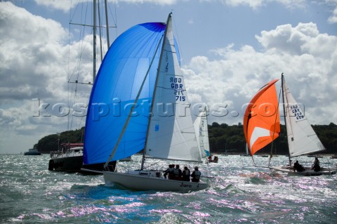 COWES ENGLAND  AUGUST 1 J80 Jura owned by Robert Napier sails past the J80 Nemo owned by Peter Henne