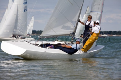 COWES ENGLAND  JULY 29 The crew of the International Etchells Class yacht Freelance lean out on the 