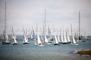 COWES, ENGLAND - JULY 29: Sailors in the classic Daring Class short tack along the shoreline during Day 1 of Skandia Life Cowes Week 2006. (Photo by Kos/Kos Picture Source via Getty Images)