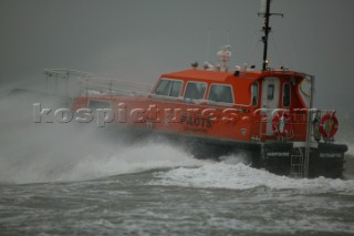Southampton Pilot Boat out on a dark grey day with sea spray