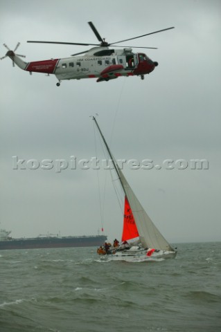 Coastguard Helicopter in Position above Yacht Innovation