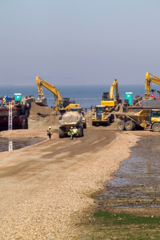 Sea defence building in whitstable kent raising the level of the beach some meters to counter rising