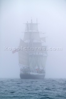 Tall ship race Torquay the Lord Nelson made her way through the fog at the start in Torbay