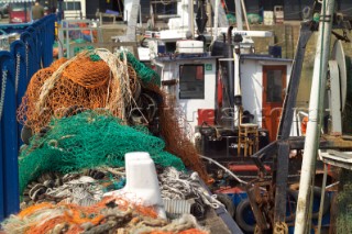 Fishing nets from trawler on quay at Whitstable harbour