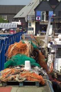 Fishing nets from trawler on quay at Whitstable harbour