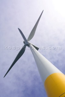 Windmills in a wind farm in sea estuary