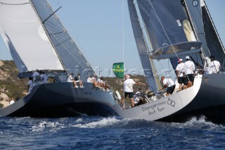 PORTO CERVO, SARDINIA - SEPT 6th 2006: The 24 metre Wally maxi yacht J ONE (FRA) owned by Jean Charles Decaux (JC Decaux) luffs to windward beneath the 24 metre Wally yacht Dangerous but Fun (MON) owned by Michelle Perris at the Maxi Yacht Rolex Cup 2006 in Porto Cervo, Sardinia. Wally Yachts, owned by Italian businessman Luca Bassani, are the most modern and technologically advanced yachts in the world. (Photo by Tim Wright/Kos Picture Source via Getty Images)