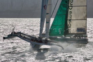 PORT de FECAMP, FRANCE - SEPT 9th 2006: The Open 60 trimaran GEANT (Fra) skippered by Michel Desjoyeaux cross tacking behind GROUPAMA-2 (Fra) skippered by Franck Cammas in the Grand Prix de Fecamp on September 9th 2006. GROUPAMA-2 won the event overall with GEANT third. The Grand Prix de Port de Fecamp is part of the Multi Cup 60 Cafe Ambassador. (Photo by Gilles Martin-Raget/Kos Picture Source via Getty Images)