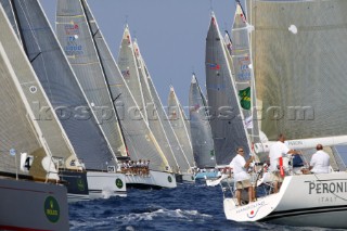 PORTO CERVO, SARDINIA - SEPT 12th 2006: Yachts fight for position on the congested startline of Race 1 in the Swan 45 fleet during Day 1 of the Rolex Swan Cup on September 12th 2006. The Rolex Swan Cup, started in 1982, is the principle event on the Swan racing circuit. Nautors Swan yachts, celebrating its 40th year in production, build the best series production yachts afloat. (Photo by Tim Wright/Kos Picture Source via Getty Images)