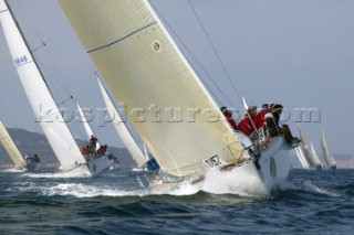 PORTO CERVO, SARDINIA - SEPT 13th 2006:  The Swan 44 Junkanoo (GBR) owned by Colin Buffin finishing 5th on Day 2 of the Rolex Swan Cup on September 13th 2006. The Rolex Swan Cup, started in 1982, is the principle event on the Swan racing circuit. Nautors Swan yachts, celebrating its 40th year in production, build the best series production yachts afloat. (Photo by Tim Wright/Kos Picture Source via Getty Images)