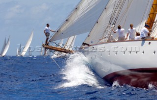 Antigua Classic Yacht Regatta April 2006. One of sequence of five pictures of bowman standing at end of bowsprit directing operations on a large boat