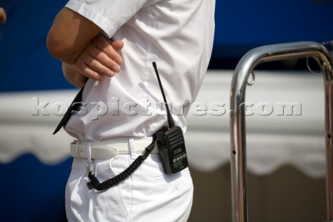 VHF radio on the hip belt of a professional crew on watch