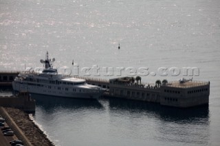 Superyacht moored next to a luxury house with helicopter - Port de Cap DAil, France